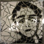 Ceramic on glass that forms a face
